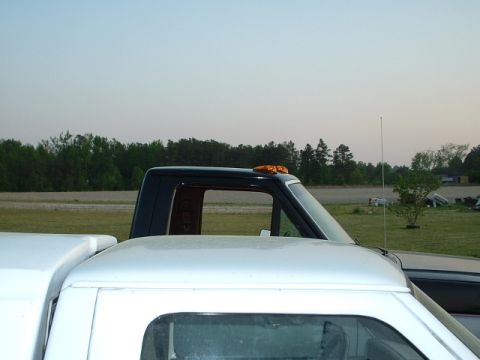 1992 Ford Ranger - Side view of a 1992 Ford Ranger cab, showing the roofline and marker lights.