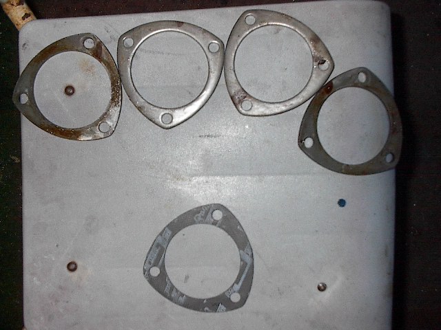 Four 3" header flanges from J.C.W and one Mr.Gasket ultraseal 3" header gasket, less than $7 CDN a pair at CTC.