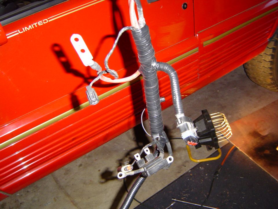 Cleaned up and re-taped the wiring harness