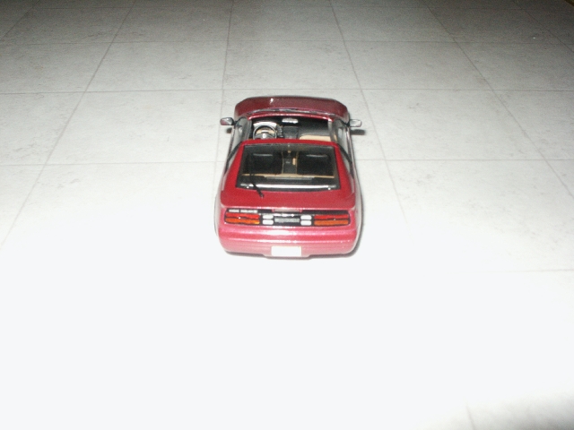 Red coupe rear view