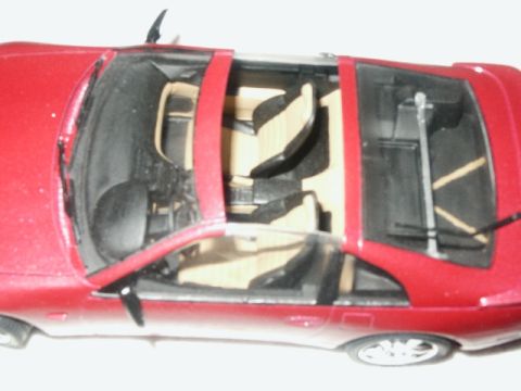 1998 Mercury Sable - The interior of a red car is visible from a top-down perspective.