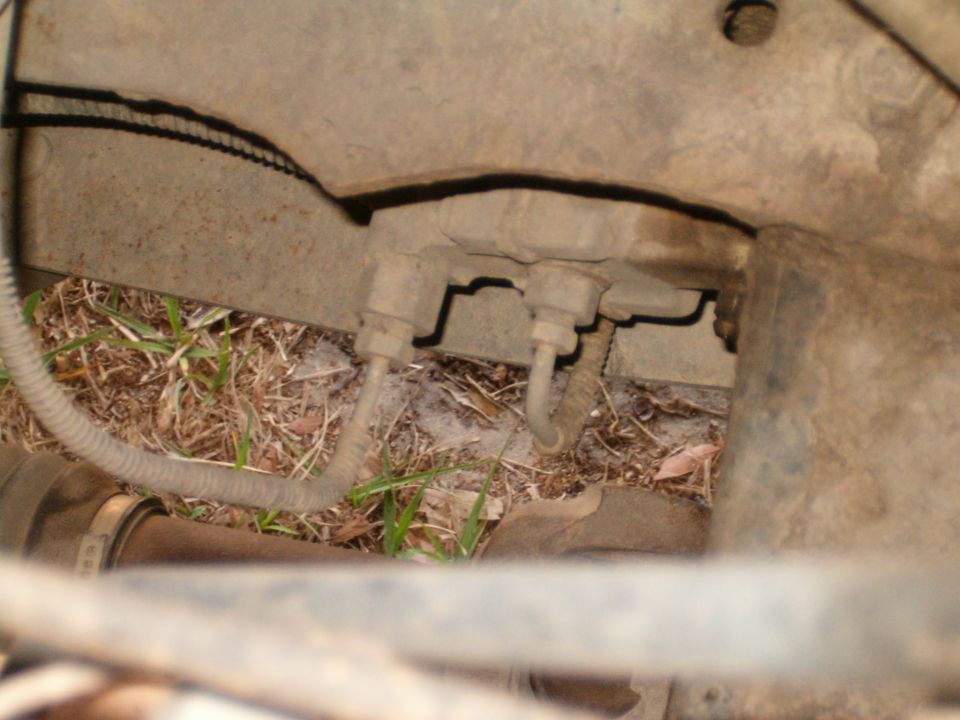 Brake lines and suspension components on a vehicle