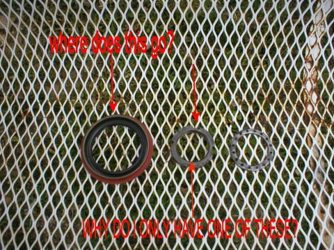 1986 Ford Bronco - Three automotive parts are shown on a white grate, with questions about their placement and quantity.