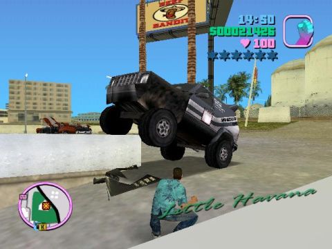 1988 Ford Bronco - This off-road truck is captured in a 3/4 front view, with another vehicle in the background.