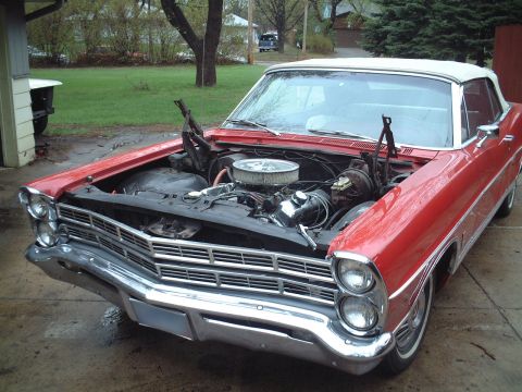 1967 Ford Galaxie - The hood has been removed. Getting ready to pull the motor.