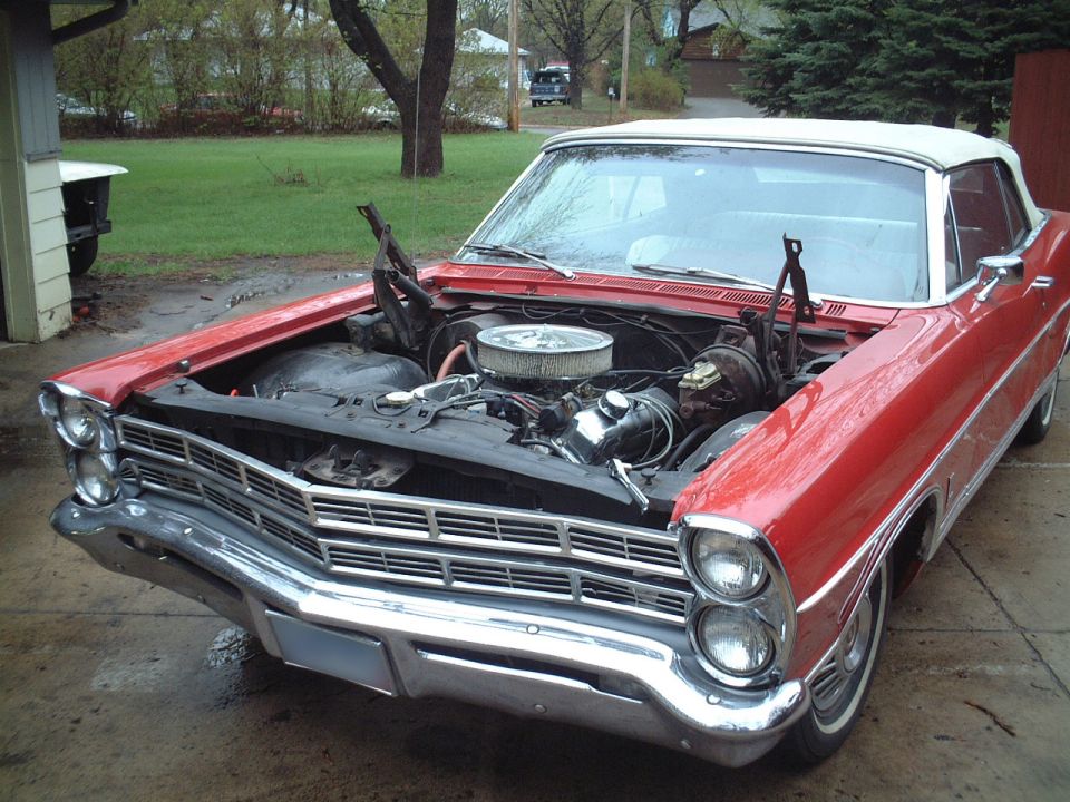 The hood has been removed.  Getting ready to pull the motor.