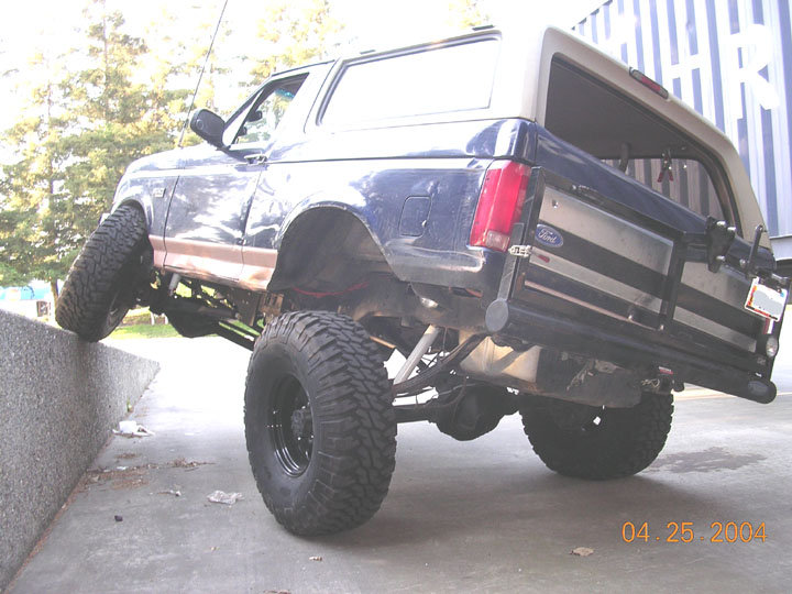 again, all tires firmly on the ground and no where near lift.  the front tire is about 36" off the ground, but the rears are ramped down, so who knows the actual difference.  

Im happy