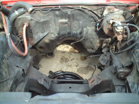 1967 Ford Galaxie - Engine compartment is empty.