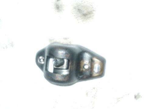 1984 Ford Bronco - A single metal rocker arm, likely from an engine, is shown against a white background.