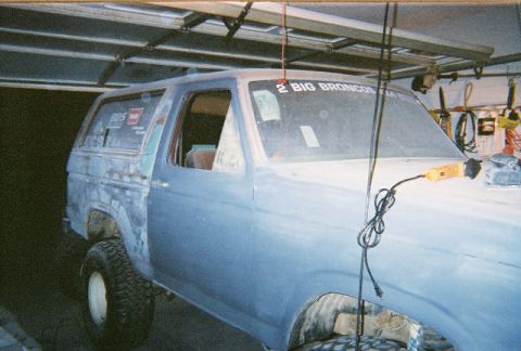 1983 Ford Bronco - This 1983 Ford Bronco is in the process of receiving body work and paint, as evidenced by the primer and unfinished panels.