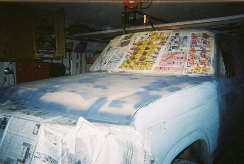 1983 Ford Bronco - A Ford Bronco is prepared for painting, with its hood and windshield covered in protective materials.