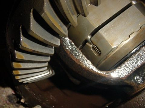 1992 Ford Bronco - This is a close-up view of differential gears, showing some wear and oil residue on the teeth.