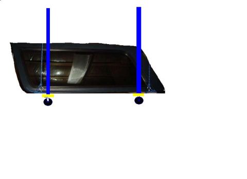 1992 Ford Bronco - Tail light assembly shown with measurement tools for reference.