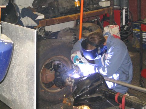 1979 Ford Bronco - stick welding the D44 "ears" to the D70