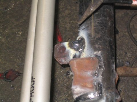 1979 Ford Bronco - after about an hour of building up weld, the trac bar mount was done..