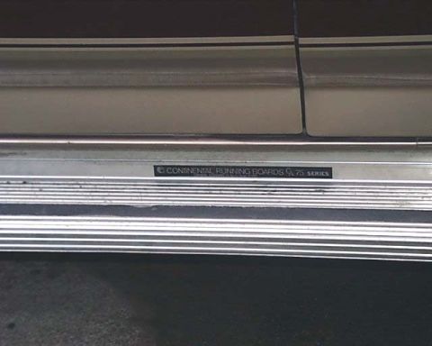 1988 Ford C-350 (Centurion Conversions) - Close-up of running boards with 'Continental Running Boards S 75 SERIES' text visible.