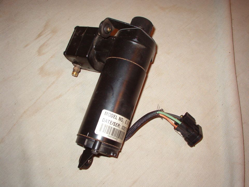 SOLD Air Compressor from a Land Rover.  Common 12V -ground; easy to wire up.  Can fill a 10L tank to ~200psi in 7-15 minutes.  3 rubber-bushed mounting tabs.  7.25Lx5.5Hx3"W (5"W across the mounting bracket; 10"L including filter & rear bracket) @ 6 lbs.  Some have 6" wires (shown); others have 12".  Inlet & outlet are pipe-threaded, and the whole thing is sealed, so it can be plumbed to run underwater.  Most include an intake filter & all include an outlet compression fitting.  They also have a built-in thermal switch (orange wire normally grounded; open when hot) that you can wire up if you choose, but it doesnt interfere with the motor - its just an output signal.  The motor pulls 3A @ 0 pressure; 8A @ max pressure.

This shows one way of wiring it up:
http://www.supermotors.net/vehicles/registry/media/280959