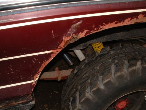 1979 Ford Bronco - Rear wheel well of a 1979 Ford Bronco shows significant rust damage.