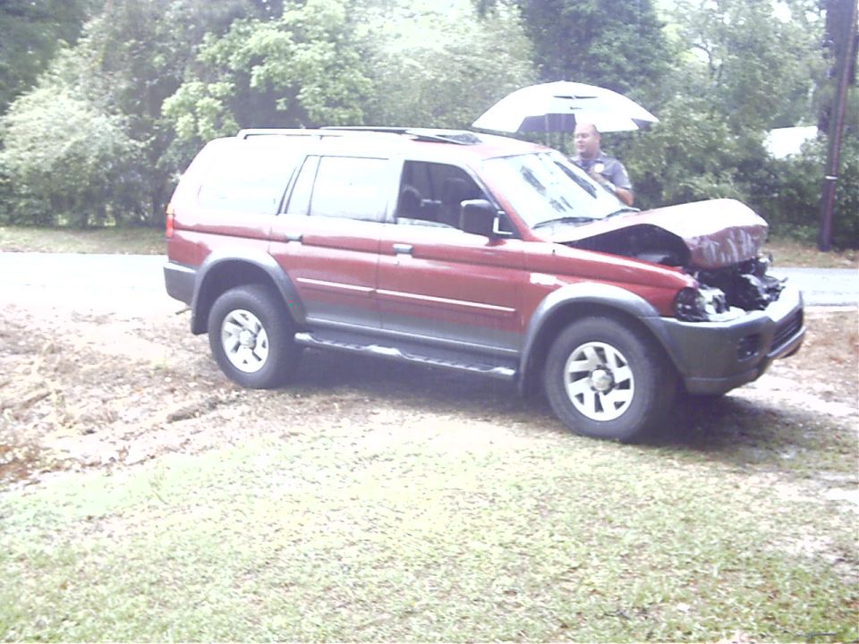 such a hard impact her sunroof popped out!!