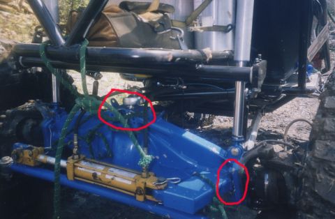 1991 Ford Bronco - A high-throttle assault on the "table top" of "Battleship" resulted in a torn housing and a torn suspension link mount putting the Spyder 2…