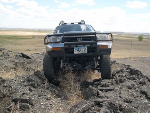 1978 Ford Bronco - This lifted Toyota 4Runner navigates challenging rocky terrain, its off-road capabilities.