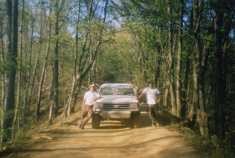 Co-pilot, Brian, the Bronco, and Brad stop for a picture on trail 2.