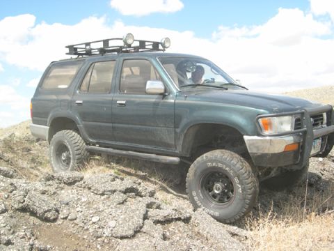 1978 Ford Bronco - This modified SUV is equipped for off-road adventures, large tires and auxiliary lights on its roof rack.
