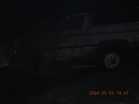 1984 Chevrolet Blazer - A dark SUV is visible from the side, with a timestamp indicating the photo was taken on May 3, 2004.