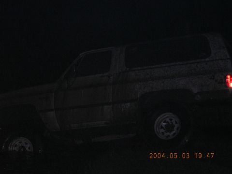 1984 Chevrolet Blazer - Side view of a 1984 Chevrolet Blazer captured in low light conditions.