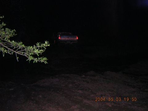 1984 Chevrolet Blazer - A Chevrolet pickup truck is seen at night with its taillights on, viewed from the rear.