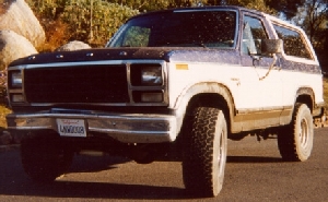 1981 Ford Bronco - Front view of a two-tone Ford Bronco, likely from the late 1970s, parked outdoors.