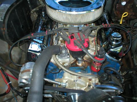 1978 Ford Bronco - Close-up of a Ford V8 engine, chrome valve covers and a prominent air filter assembly.