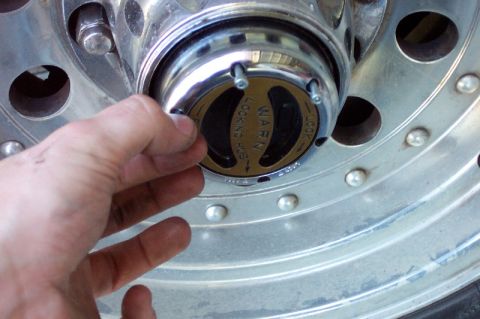 1992 Ford Bronco - Install the cap and tighten the screws gently