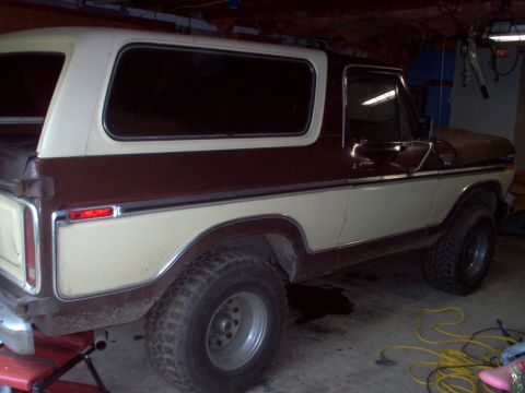 1979 Ford Bronco - This 1978 Ford Bronco is seen from the side in a garage setting.