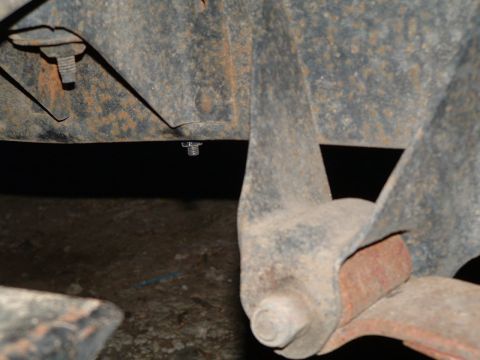 1979 Ford Bronco - thats the front leaf mount & the nut you see is the light mount