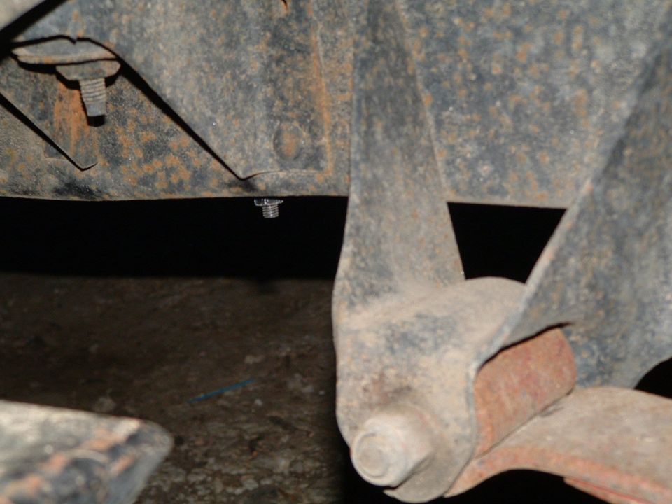 thats the front leaf mount & the nut you see is the light mount
