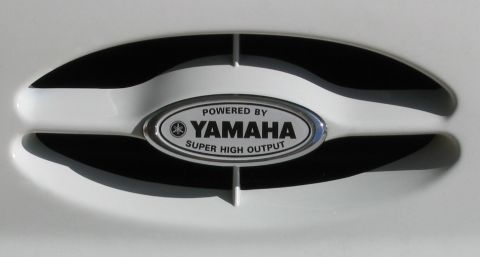 1998 Ford Taurus - Close-up of a Yamaha Super High Output badge, indicating a powerful engine.