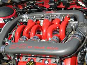 1998 Ford Taurus - Close-up of a Ford SHO V8 engine, showing the intake manifold and valve covers.