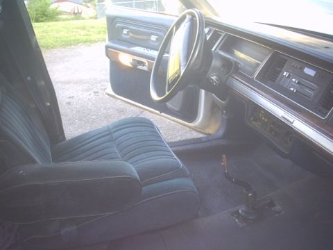 1991 Ford LTD Crown Victoria - Interior view of a 1991 Ford Crown Victoria, highlighting the dashboard and seating.