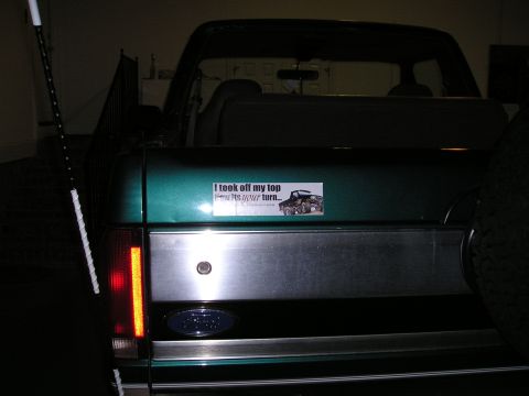 1996 Ford Bronco - This 1996 Ford Bronco shows off its removable top feature with a humorous sticker on the tailgate.