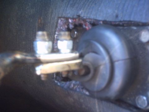 1991 Ford Crown Victoria - Close-up view of a starter motor solenoid, showing its terminals and contact mechanism.