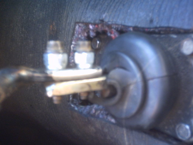 Starter motor solenoid with two terminals and brass contact