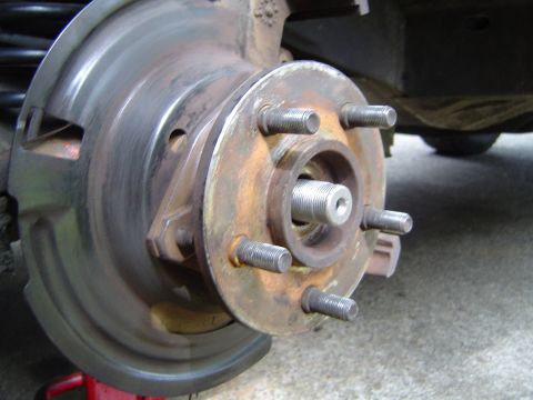 1993 Jeep Grand Cherokee - Then the dust shield, and hub which bolts on from the back