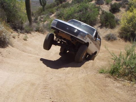 1993 Ford Bronco - This 1993 Ford Bronco navigates a steep, sandy incline during an off-road excursion.