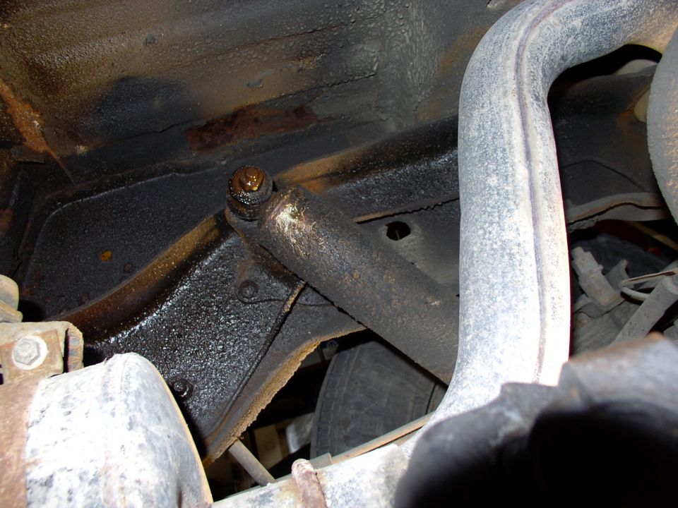 I wire brushed the threads and basted them with penetrating oil a few weeks ahead. Note that beautiful mandrel bent Dynomax 2 1/2" tailpipe rusting away !