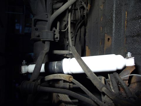 1986 Ford Bronco - New air shocks in place. Now the Bronco sits where it should. Before it had that nose higher than tail attitude, in spite of new 3/4 ton le…