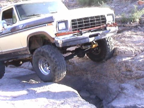 1979 Ford Bronco - This 1979 Ford Bronco navigates a rocky trail, its off-road capabilities.