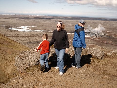 1996 Ford Bronco - A family enjoys a scenic overlook of a geothermal power plant and surrounding volcanic terrain.