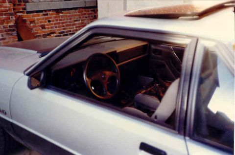 1967 Ford Fairlane - Interior view of a silver car, showing the dashboard, steering wheel, and seats.