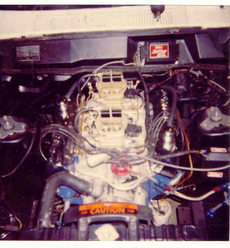 1967 Ford Fairlane - Engine bay view of a V8 engine with dual carburetors and associated components.
